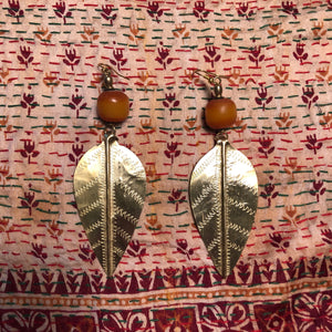 Large brass Turkana earrings with African amber copal beads